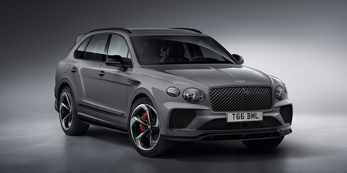Bentley Jinan Bentley Bentayga S in Cambrian Grey paint front three - quarter view with dark chrome matrix grille and featuring elliptical LED matrix headlights. 