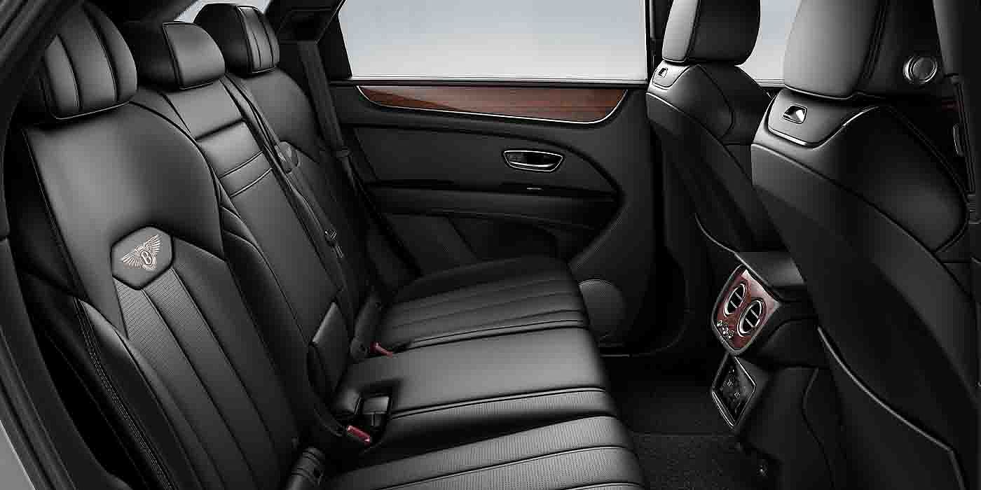 Bentley Jinan Bentley Bentayga EWB interior view for rear passengers with Beluga black hide.